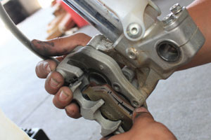 Check your bike's Owner's Manual for torque specifications on the brake caliper pin.
