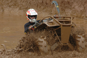 A deep and dark mud hole can be the Mt. Everest of ATV riding.