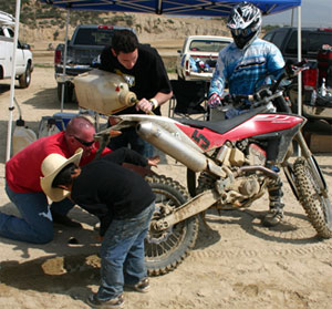  Team Husky in the pits! The kids are alright - stops were made smooth and quick