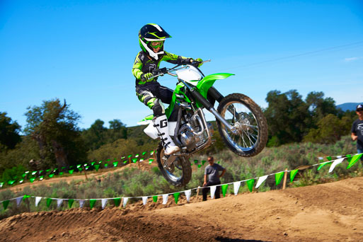 2013 Kawasaki KLX 140 Kid Riding Kawasaki Dirt Bike on Track