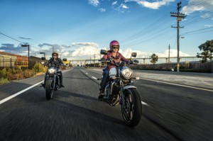 Women cruising down road