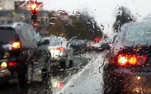 Rain on windshield at stoplight