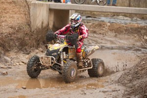 ATV on muddy track